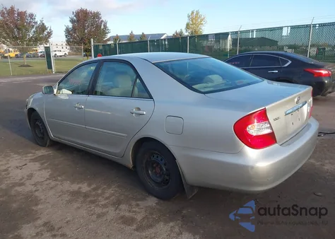 2002 Toyota Camry Le from USA, damaged, VIN 4T1BE32K22U010806